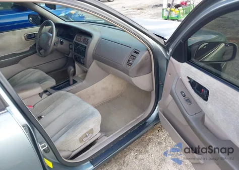 1999 Toyota Avalon Xl from USA, damaged, VIN 4T1BF18B0XU328519